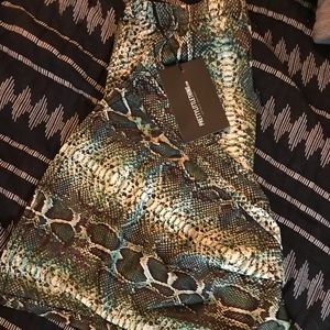 NWT green snake print slinky bells. Stretchy!